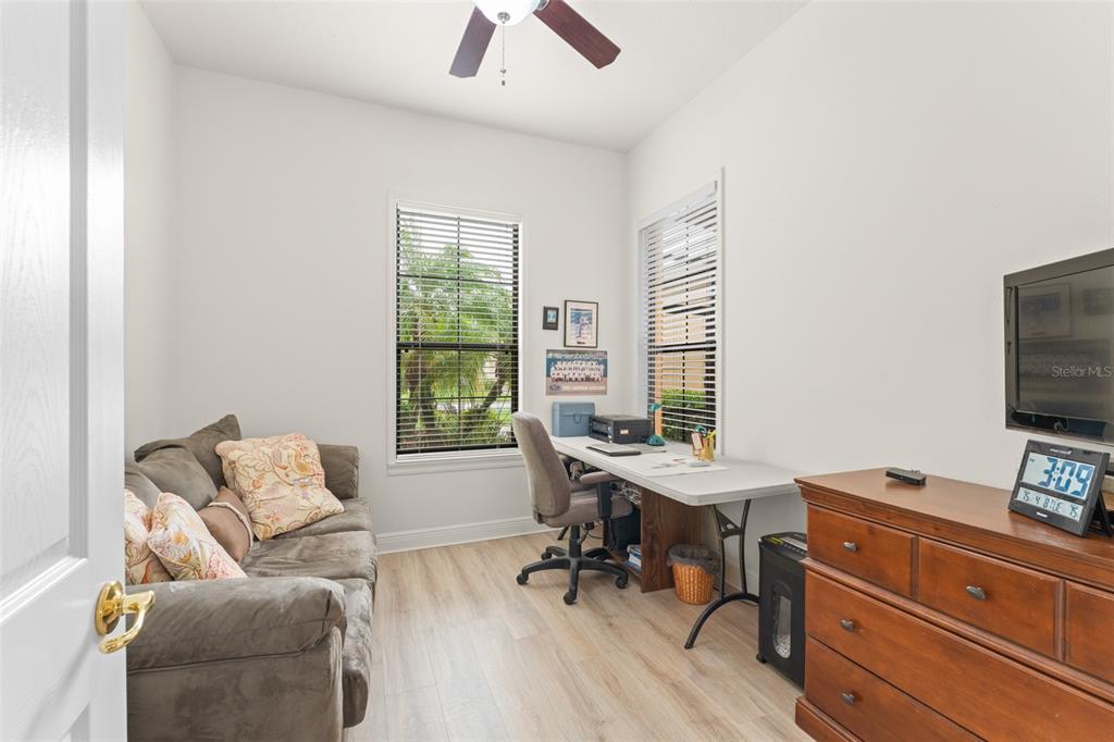 724 Villa Park Road Poinciana, FL 34759 - Photo 16 of 62 a workspace with furniture and a window