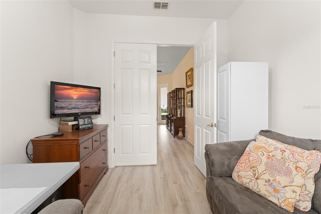 724 Villa Park Road Poinciana, FL 34759 - Photo 17 of 62 a living room with furniture and a flat screen tv