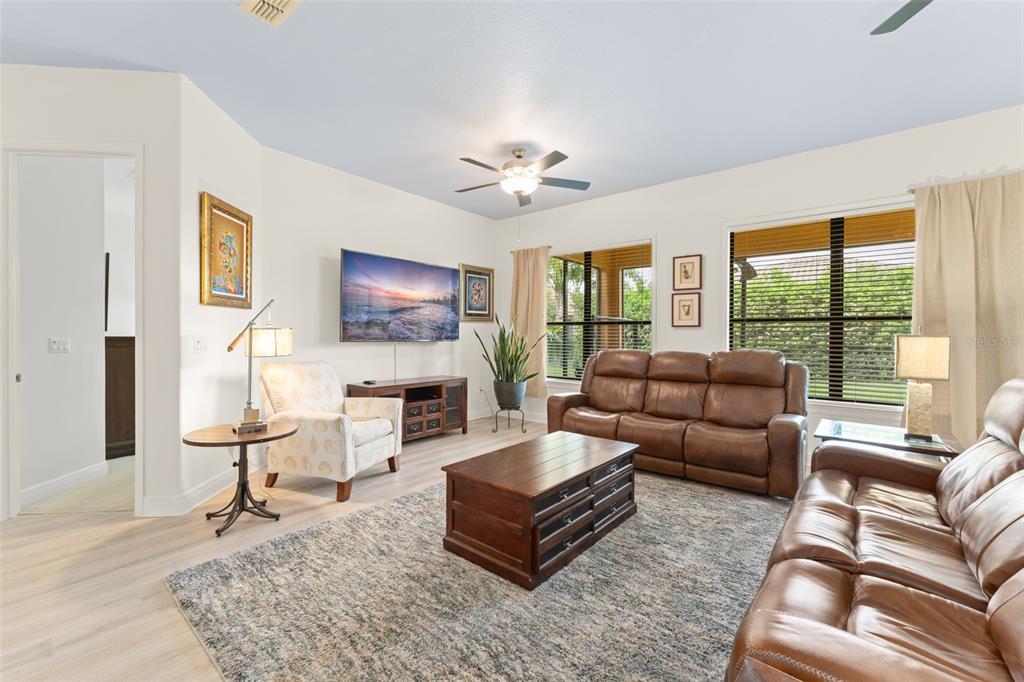 724 Villa Park Road Poinciana, FL 34759 - Photo 3 of 62 a living room with furniture and a large window