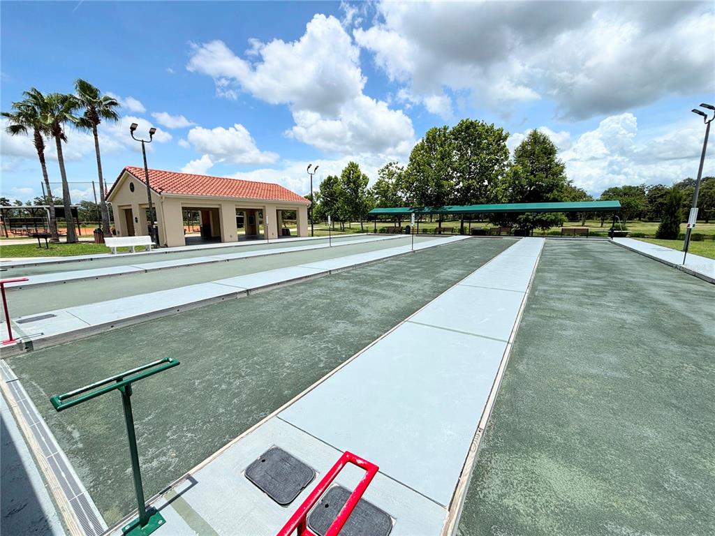 724 Villa Park Road Poinciana, FL 34759 - Photo 60 of 62 a view of a street with a building in the background
