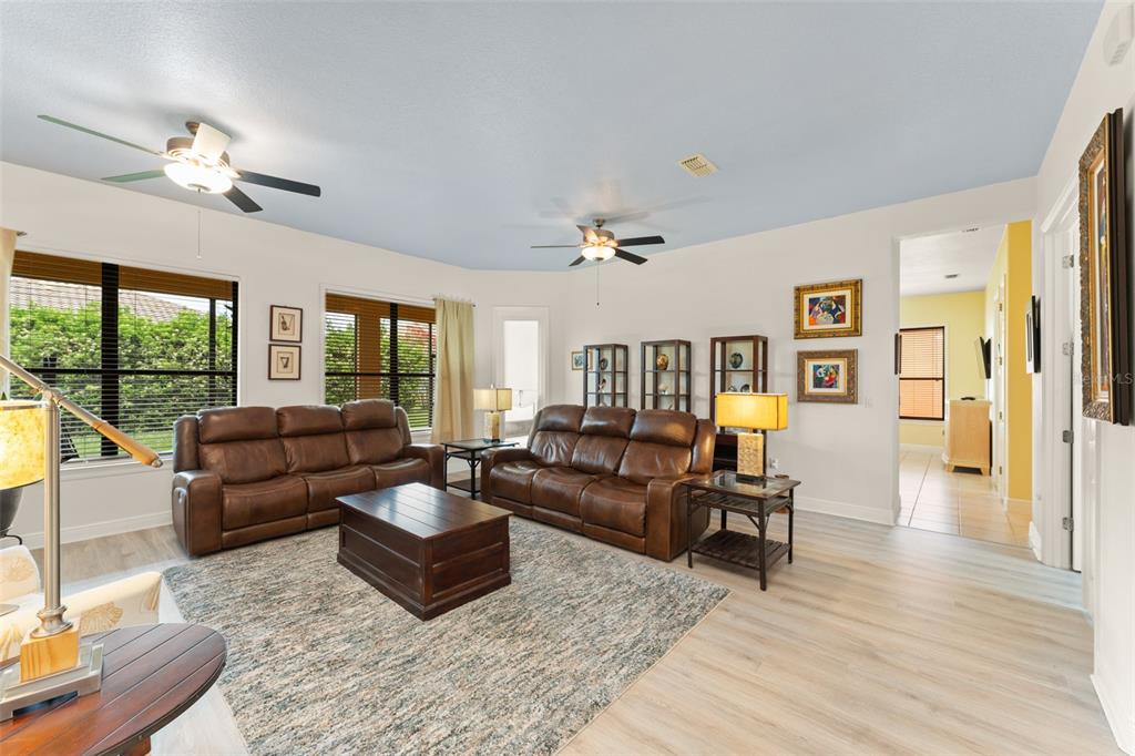 724 Villa Park Road Poinciana, FL 34759 - Photo 7 of 62 a living room with furniture and a large window
