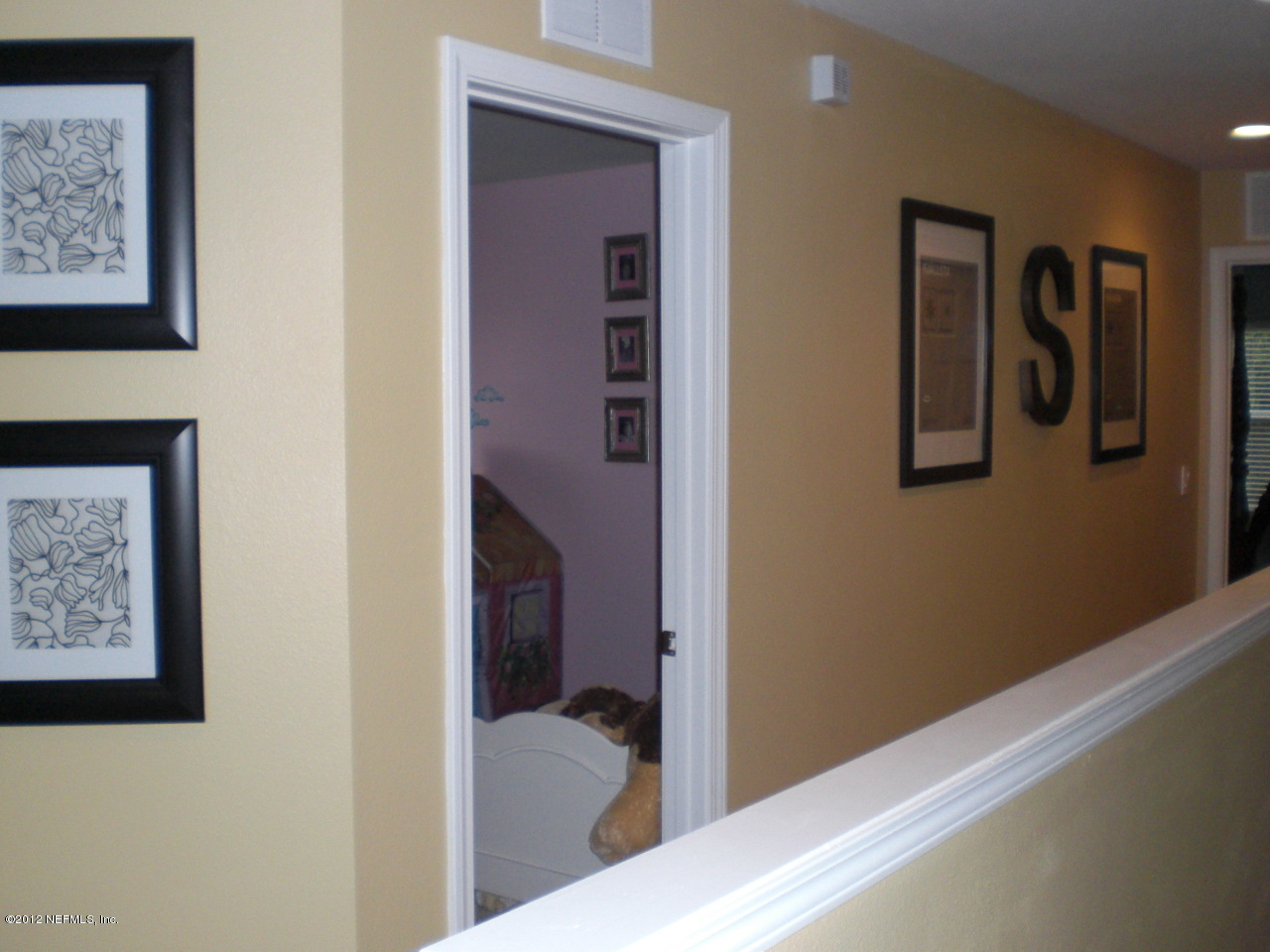 6963 Roundleaf Drive Jacksonville, FL 32258 - Photo 9 of 16 a view of a hallway with a elevator