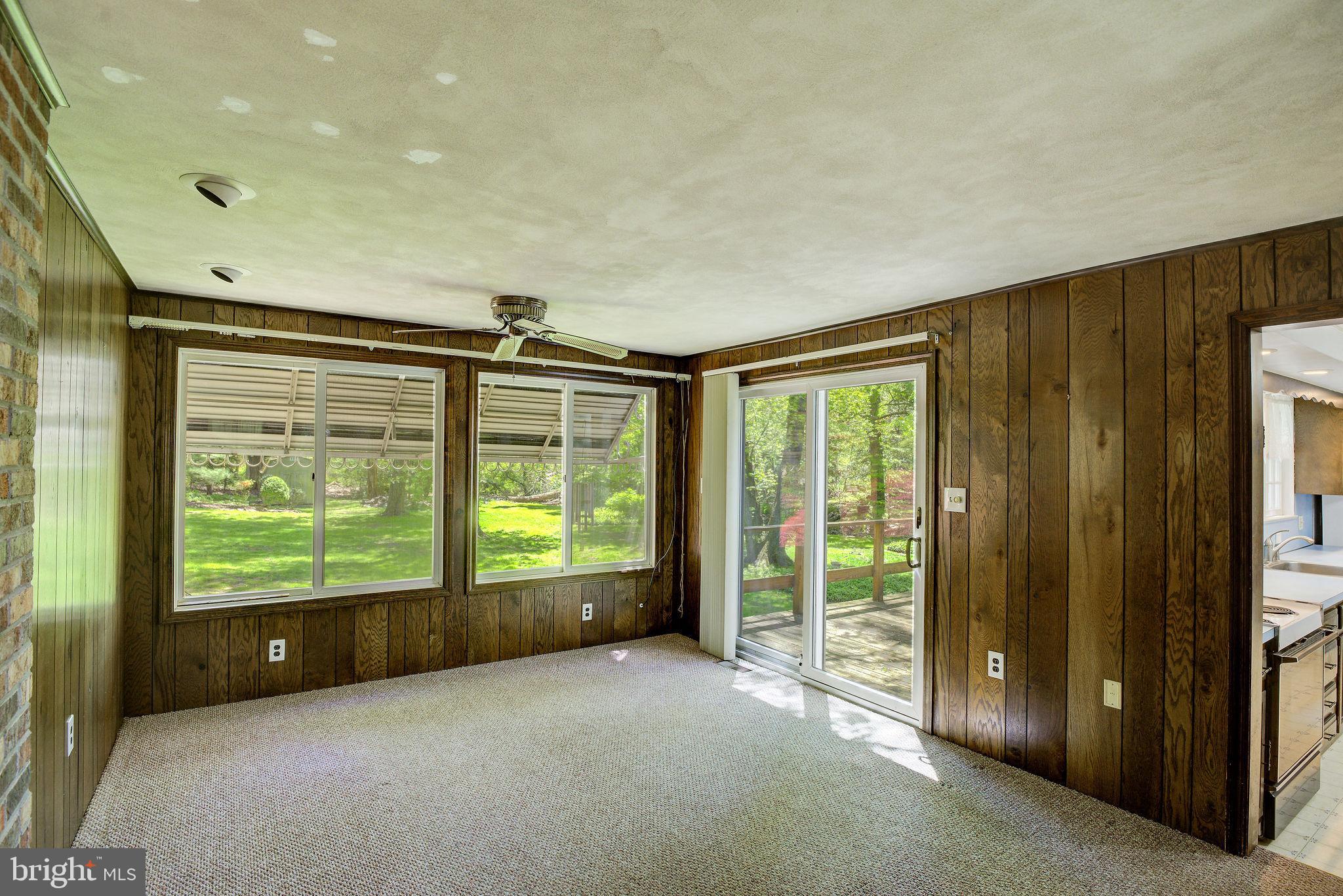 17 Wilburtha Road Ewing, NJ 08628 - Photo 11 of 23 Family room with sliding door to the bucolic yard