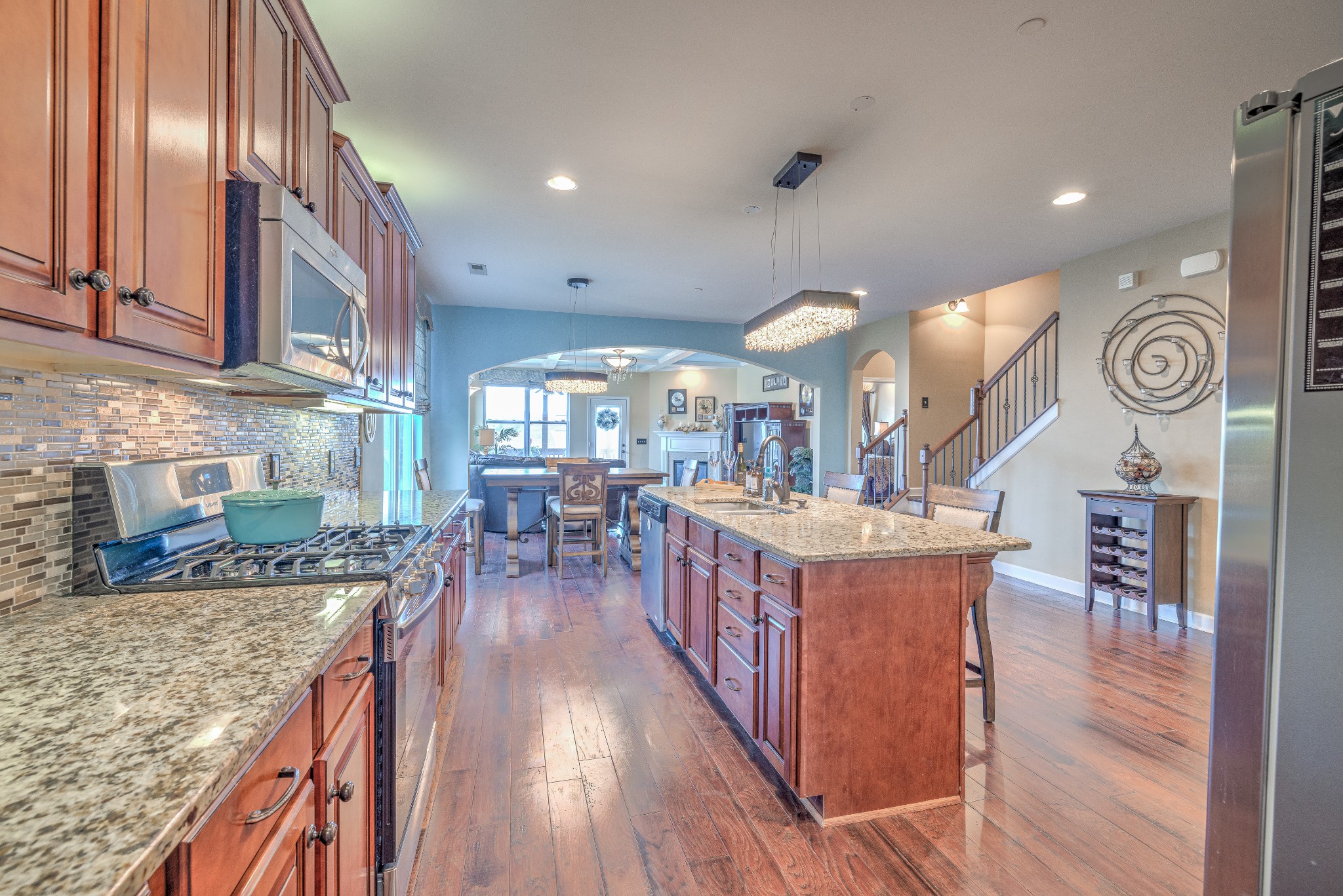 5048 Falling Water Road Nolensville, TN 37135 - Photo 12 of 40 a kitchen with stainless steel appliances granite countertop lots of counter top space
