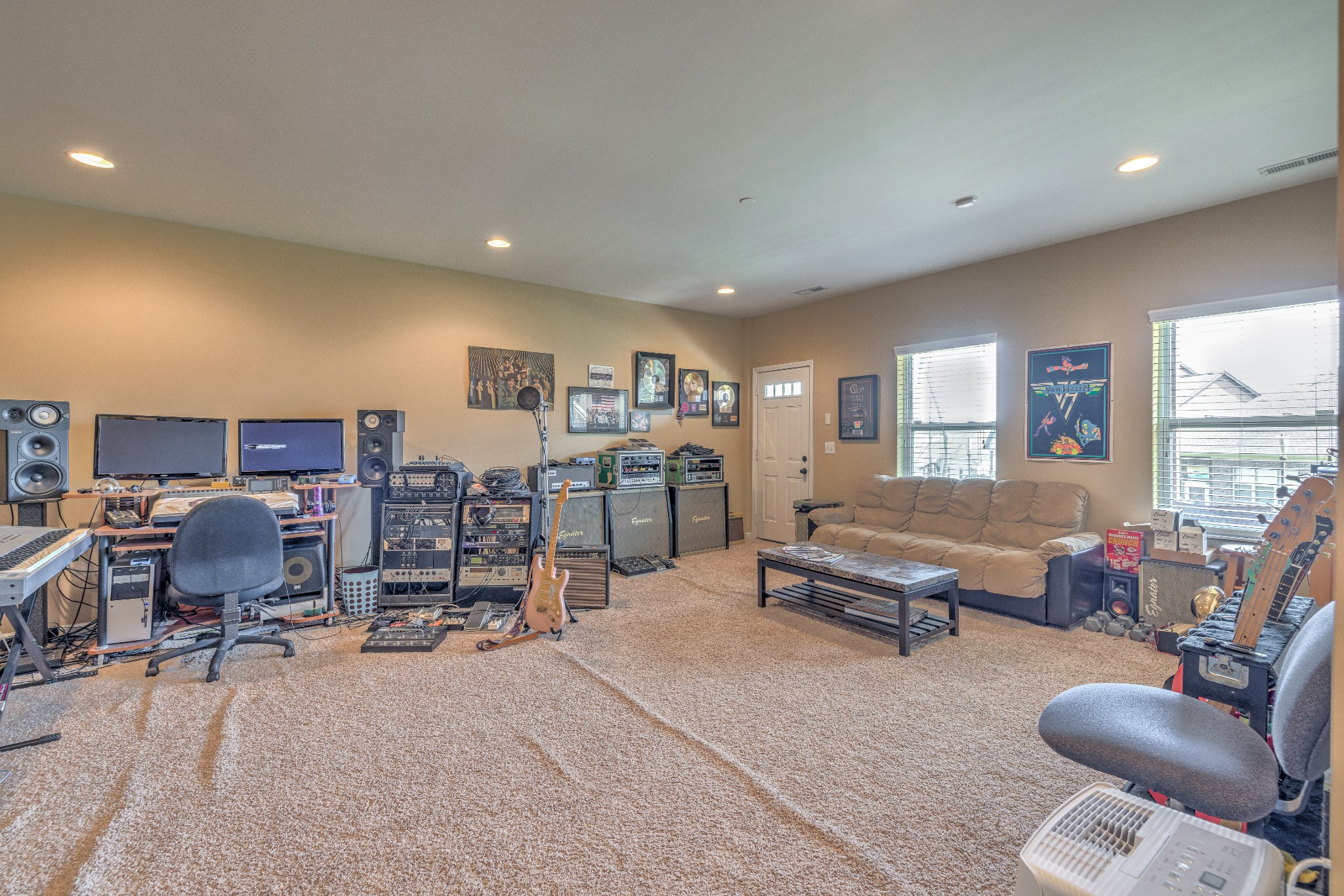 5048 Falling Water Road Nolensville, TN 37135 - Photo 29 of 40 a living room with furniture gym equipment and a large window