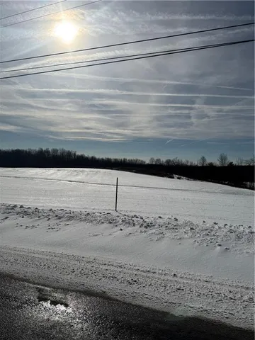 a view of water heater and a floor