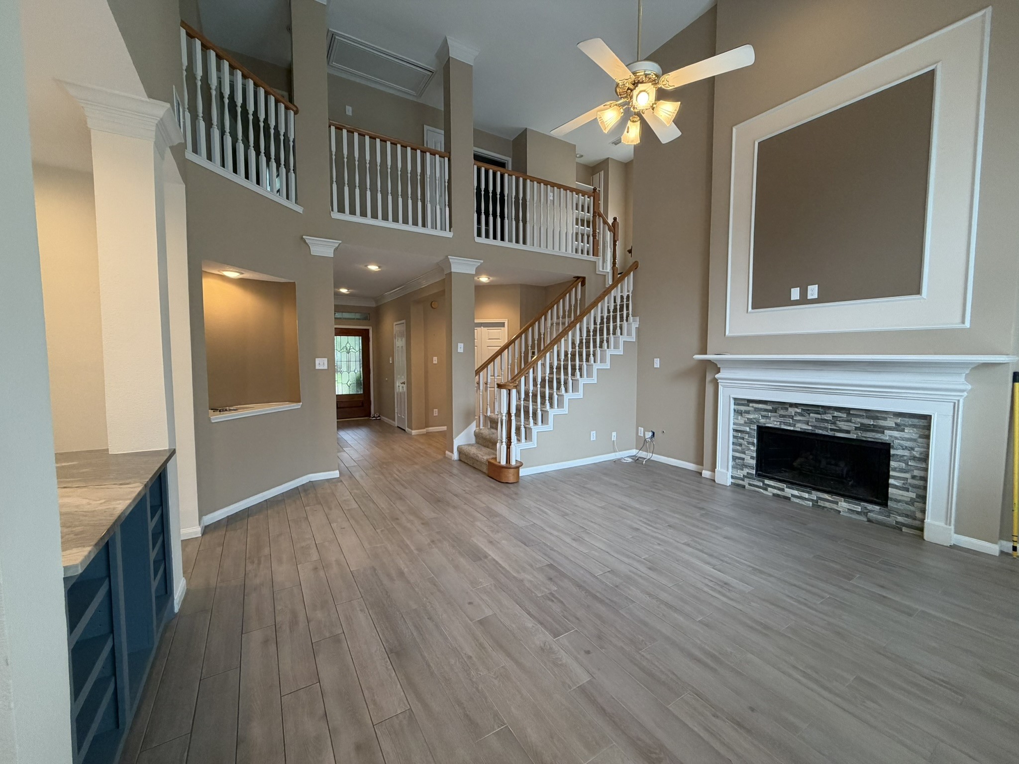 13810 Inland Spring Court Houston, TX 77059 - Photo 16 of 27 Living room with fireplace. Can easily accommodate larger furniture