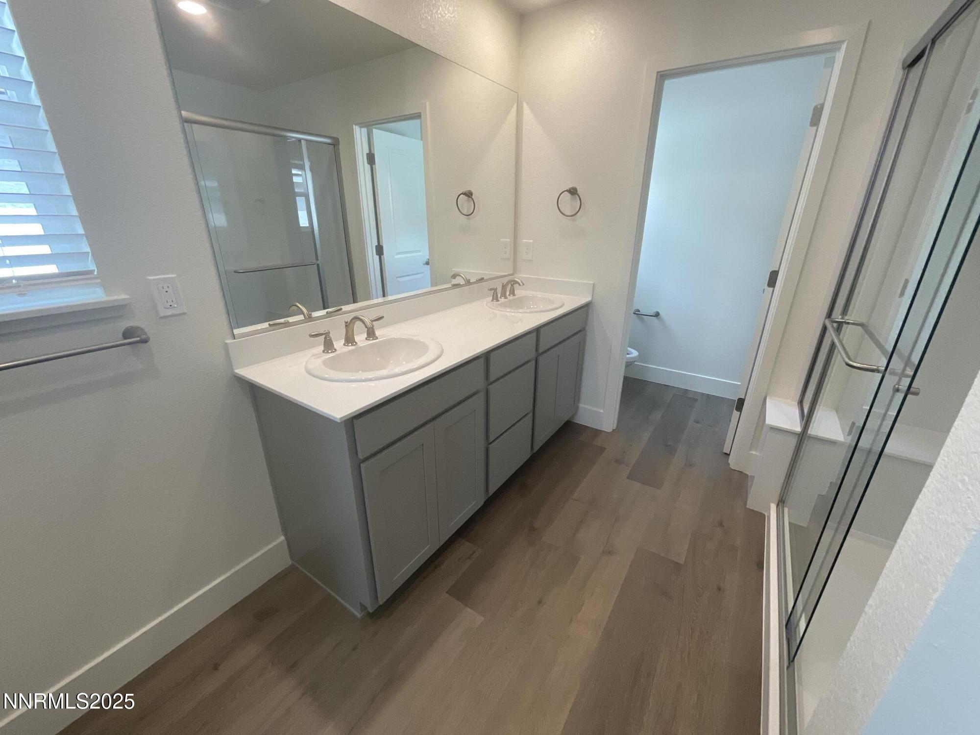 4128 Scenic Drive Reno, NV 89523 - Photo 17 of 20 a bathroom with a sink and a mirror
