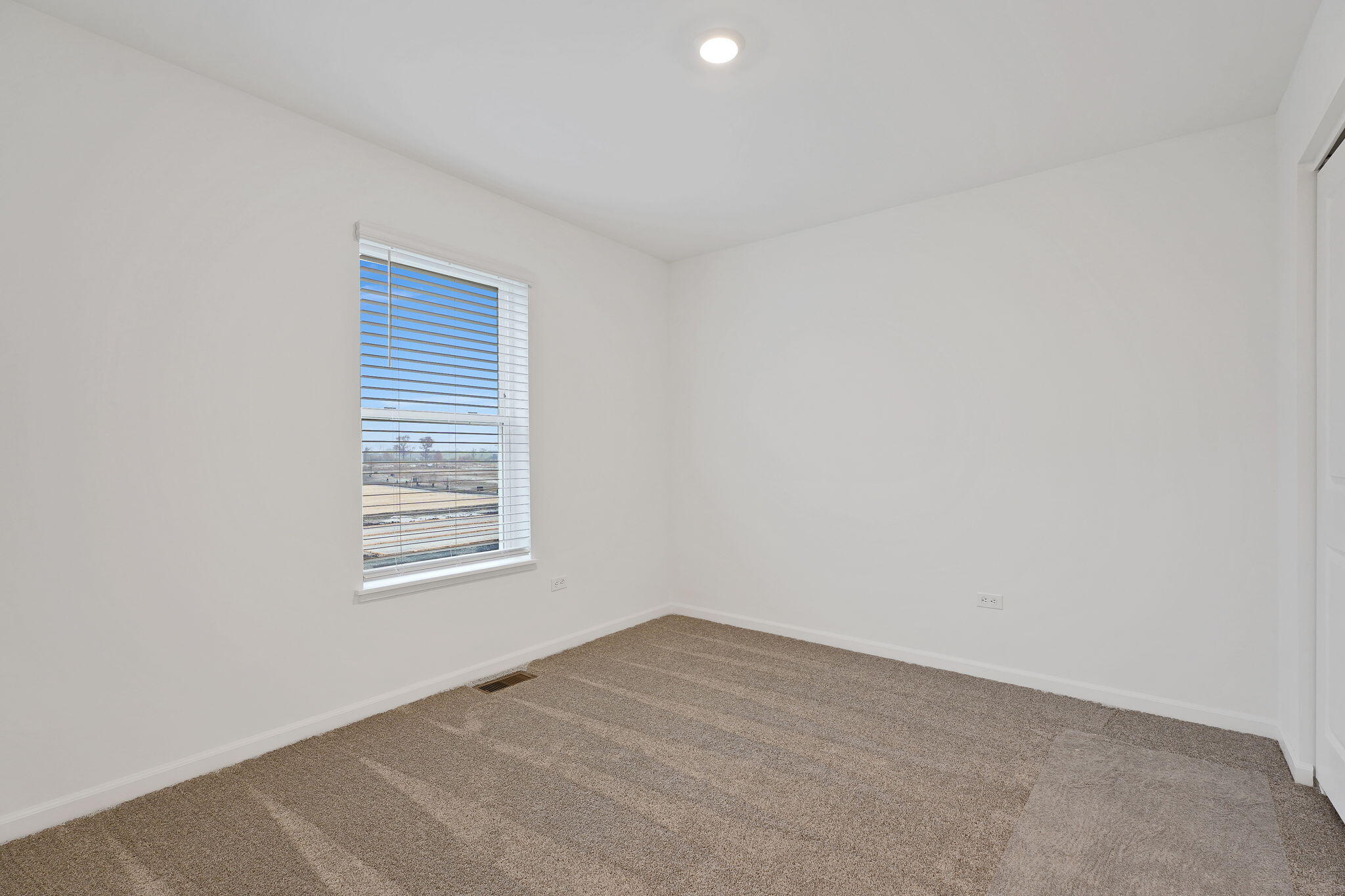 521 East 127th Place Crown Point, IN 46307 - Photo 23 of 37 a view of an empty room with a window