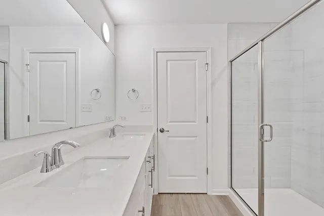 a bathroom with a sink and mirror