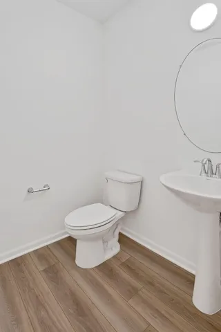 a bathroom with a toilet and a sink