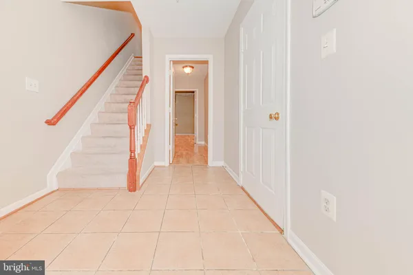 a view of an entryway with staircase