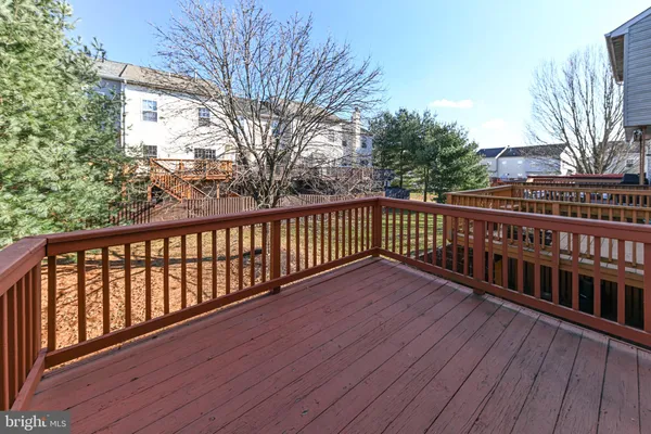 a view of wooden balcony with outdoor space