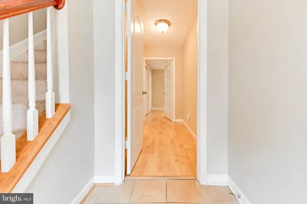 a view of a bathroom from a hallway