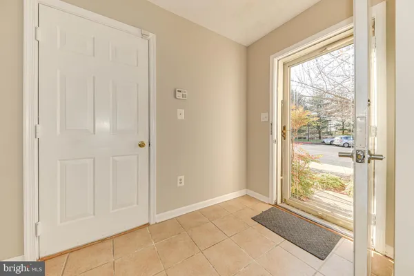 a view of a hallway with a glass door