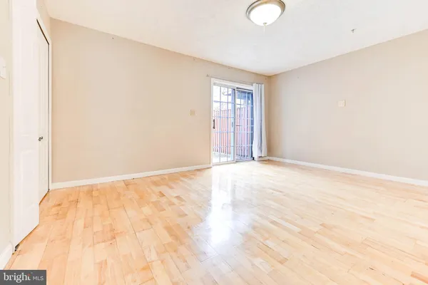 a view of an empty room and window