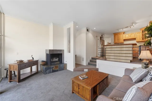 a balcony with table and chairs potted plants with wooden floor