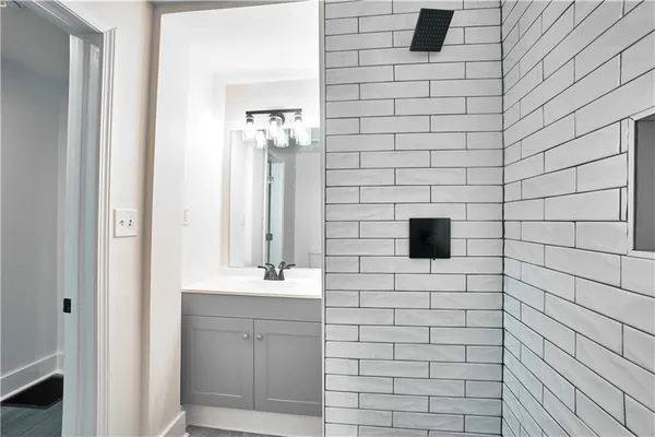 a bathroom with a sink and a mirror