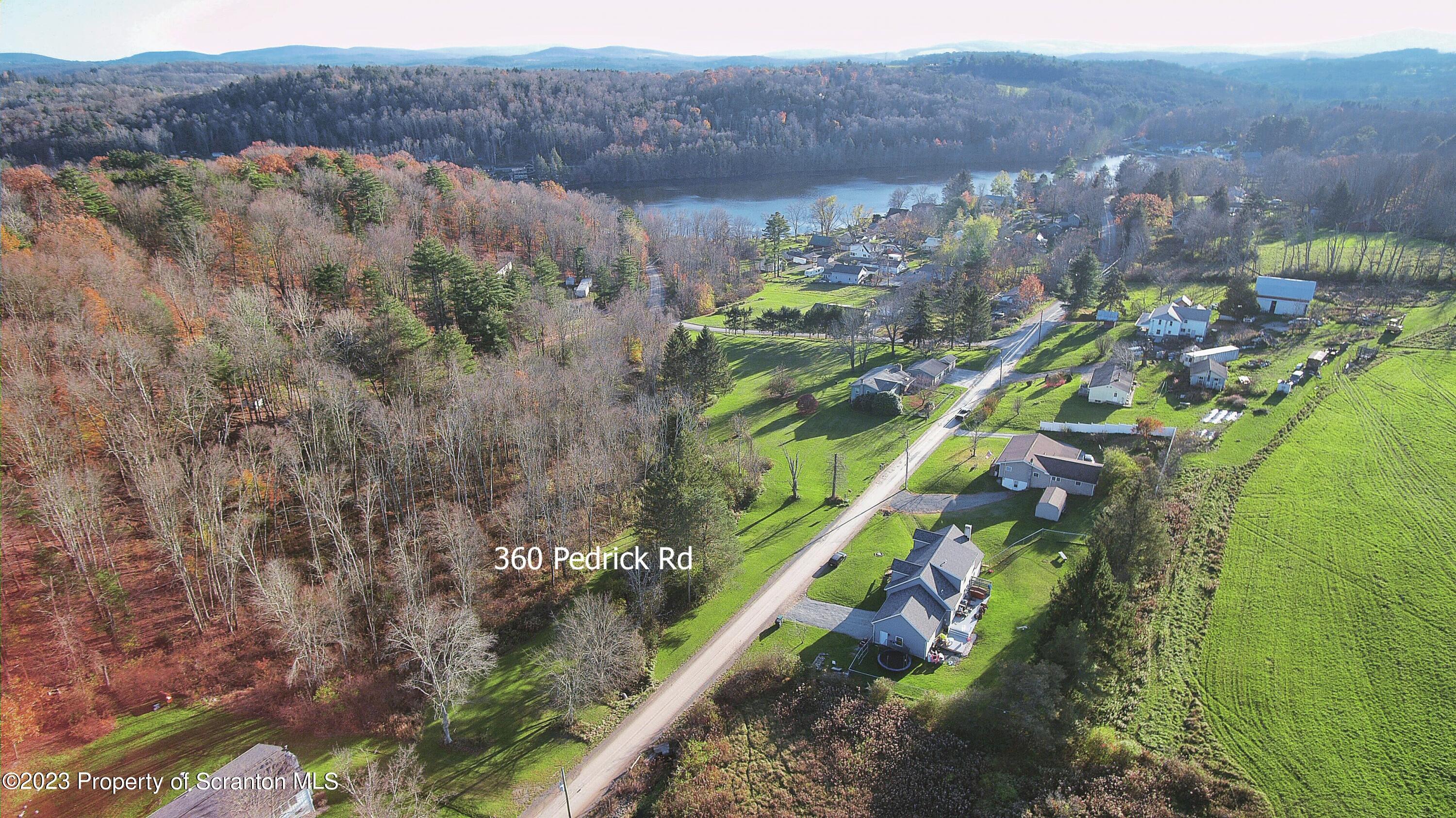360 Pedrick Road Nicholson, PA 18446 - Photo 4 of 8 a view of lake and mountain