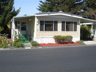 67 Cardinal Way, Unit 24 Santa Rosa, CA 95409 - Photo 1 of 11 front view of a house with a small yard