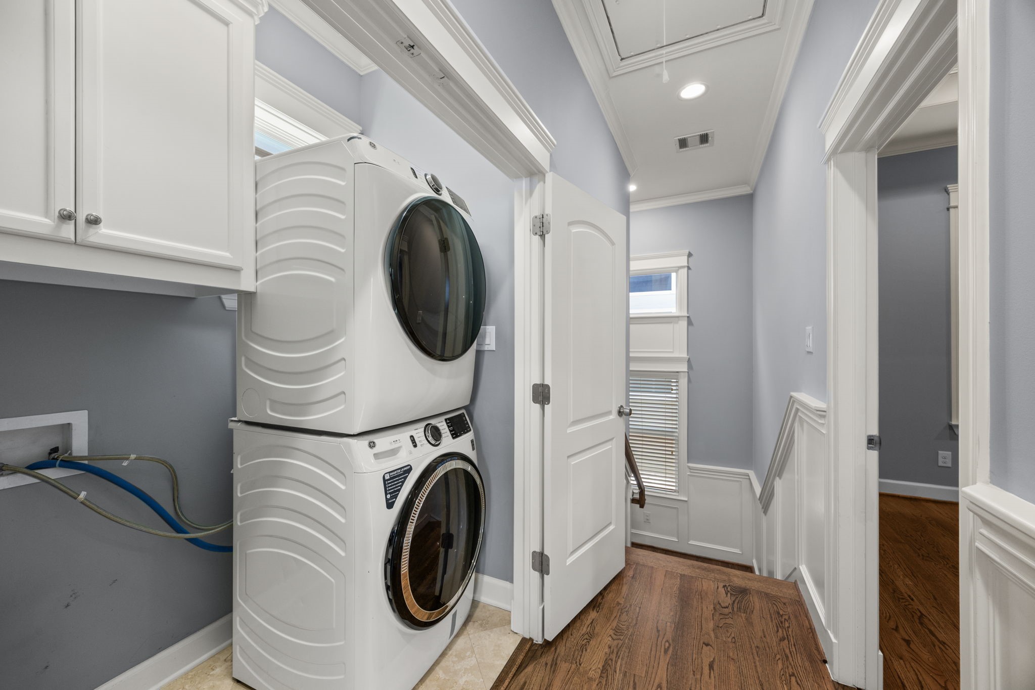 619 Rutland Street, Unit B Houston, TX 77007 - Photo 25 of 33 a utility room with dryer and washer