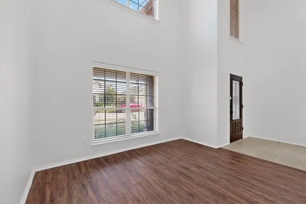 a view of entryway with wooden floor