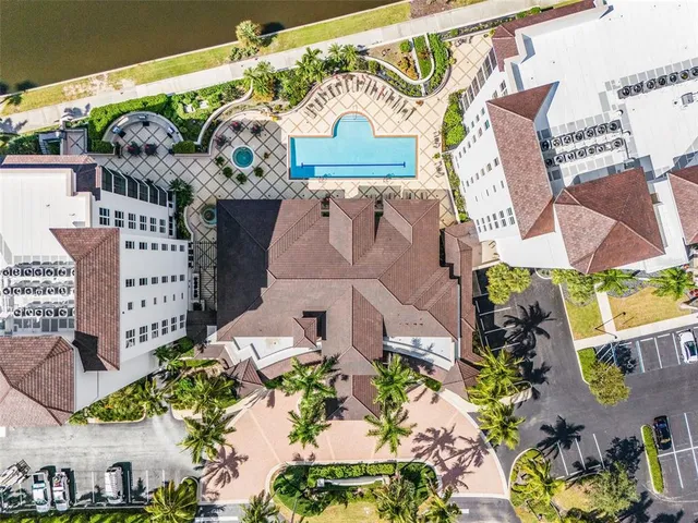 a room with lots of furniture and a chandelier