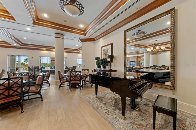 a front view of a multi story building with yard