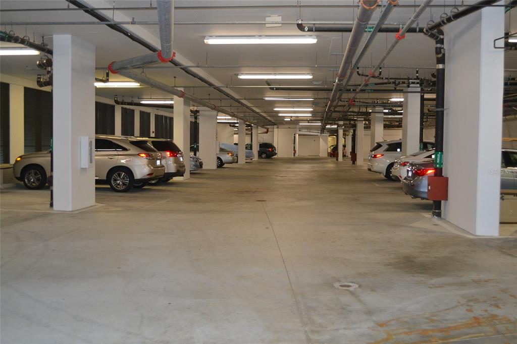 3333 Sunset Key Circle, Unit 103 Punta Gorda, FL 33955 - Photo 51 of 58 a view of parking garage with cars