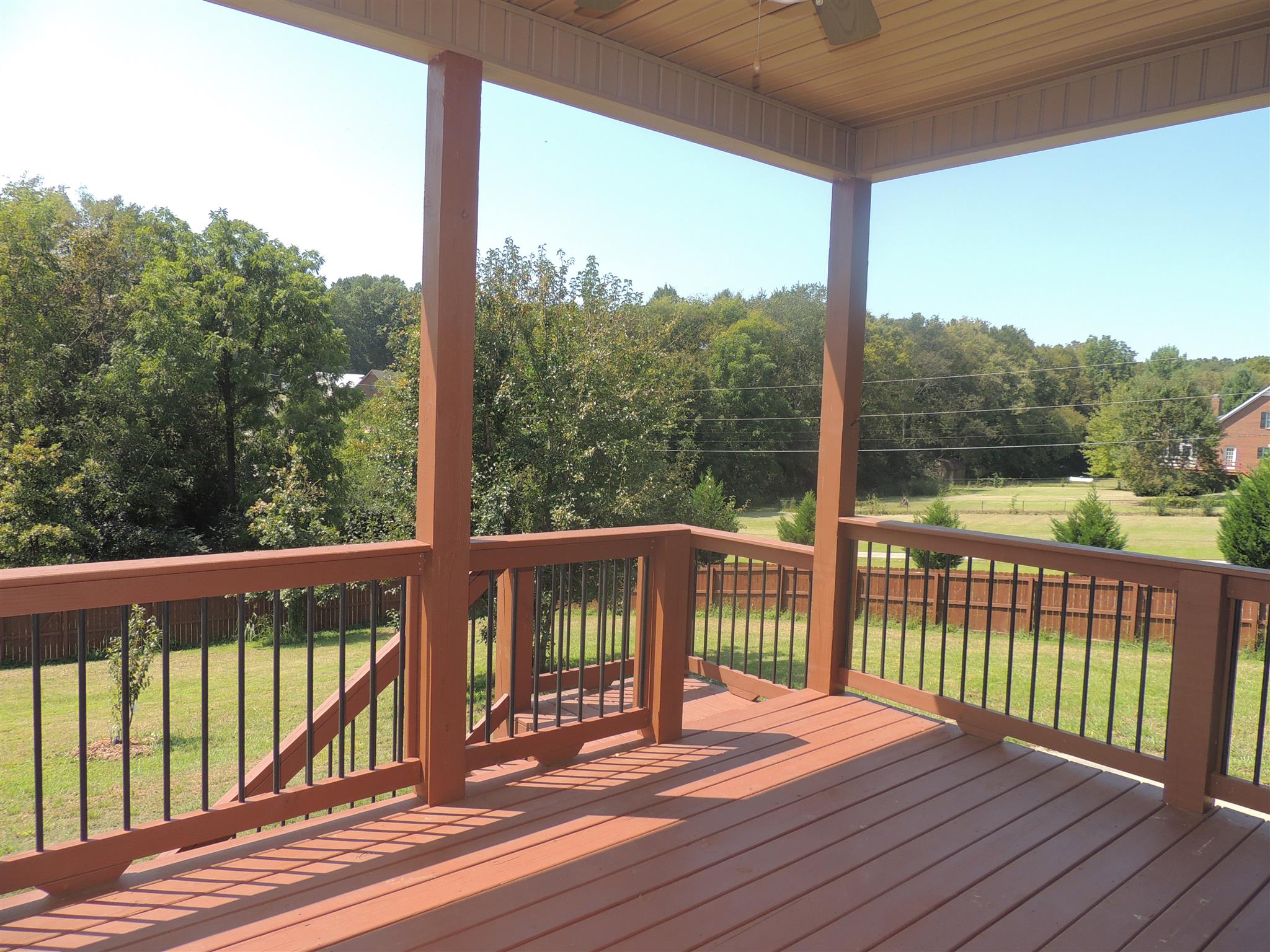 3172 Marthas Chapel Road Cunningham, TN 37052 - Photo 16 of 29 a view of a balcony with wooden floor