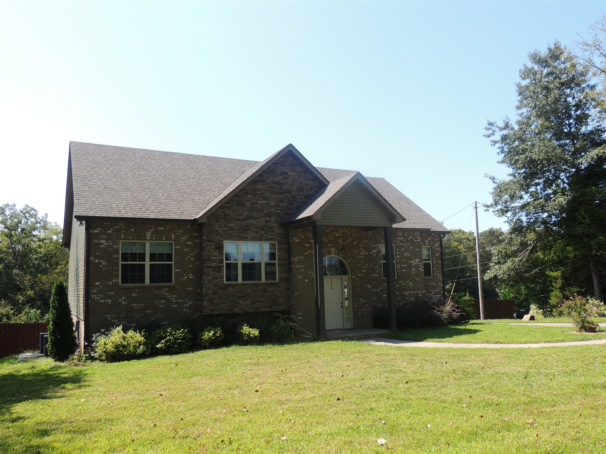 3172 Marthas Chapel Road Cunningham, TN 37052 - Photo 2 of 29 a view of a house with a yard