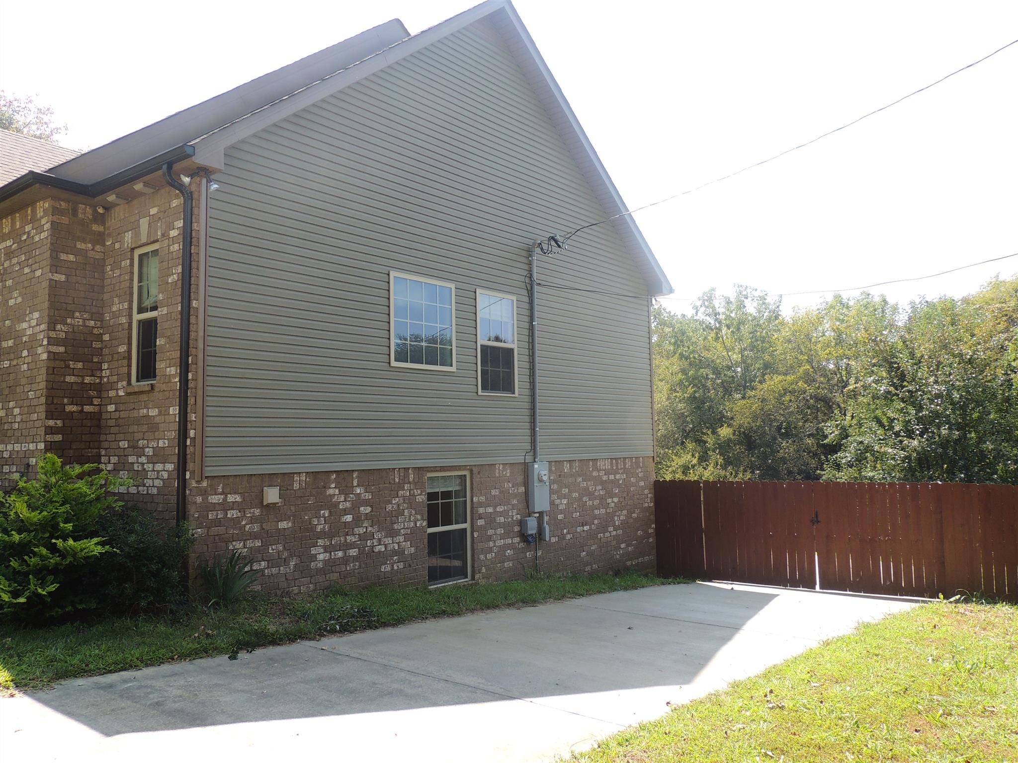 3172 Marthas Chapel Road Cunningham, TN 37052 - Photo 23 of 29 a backyard of a house with lots of green space