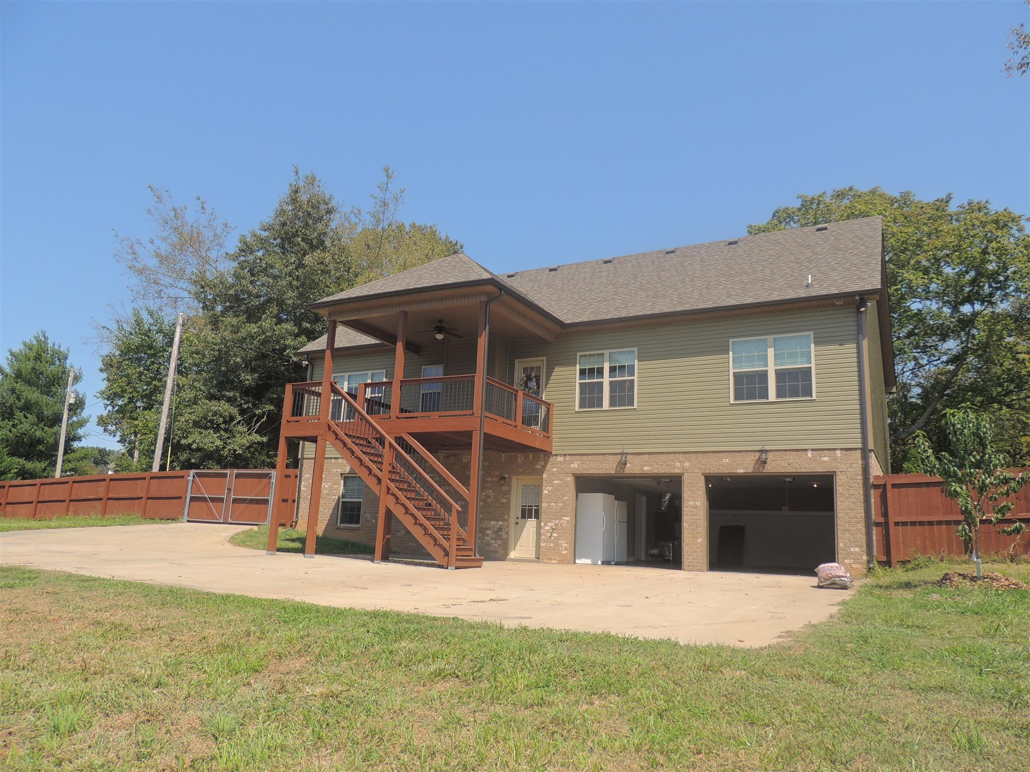 3172 Marthas Chapel Road Cunningham, TN 37052 - Photo 6 of 29 a front view of a house with a yard