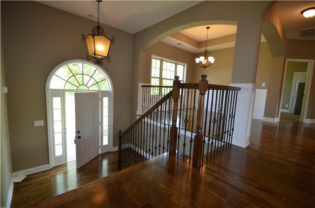 3172 Marthas Chapel Road Cunningham, TN 37052 - Photo 9 of 29 a view of entryway and hall with wooden floor