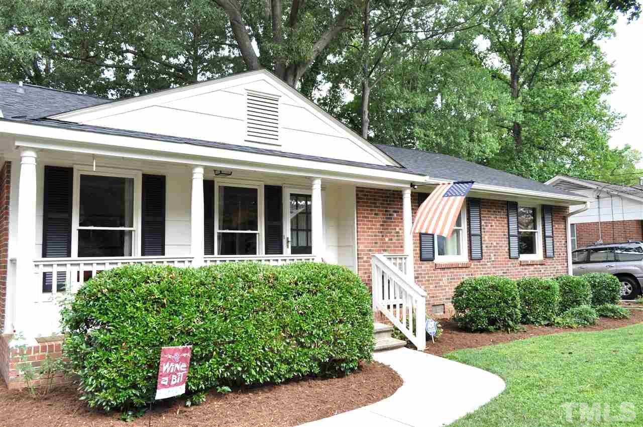 4908 Auburn Road Raleigh, NC 27609 - Photo 2 of 25 front view of a house with a yard