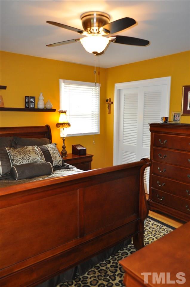4908 Auburn Road Raleigh, NC 27609 - Photo 18 of 25 a view of a couch in a room