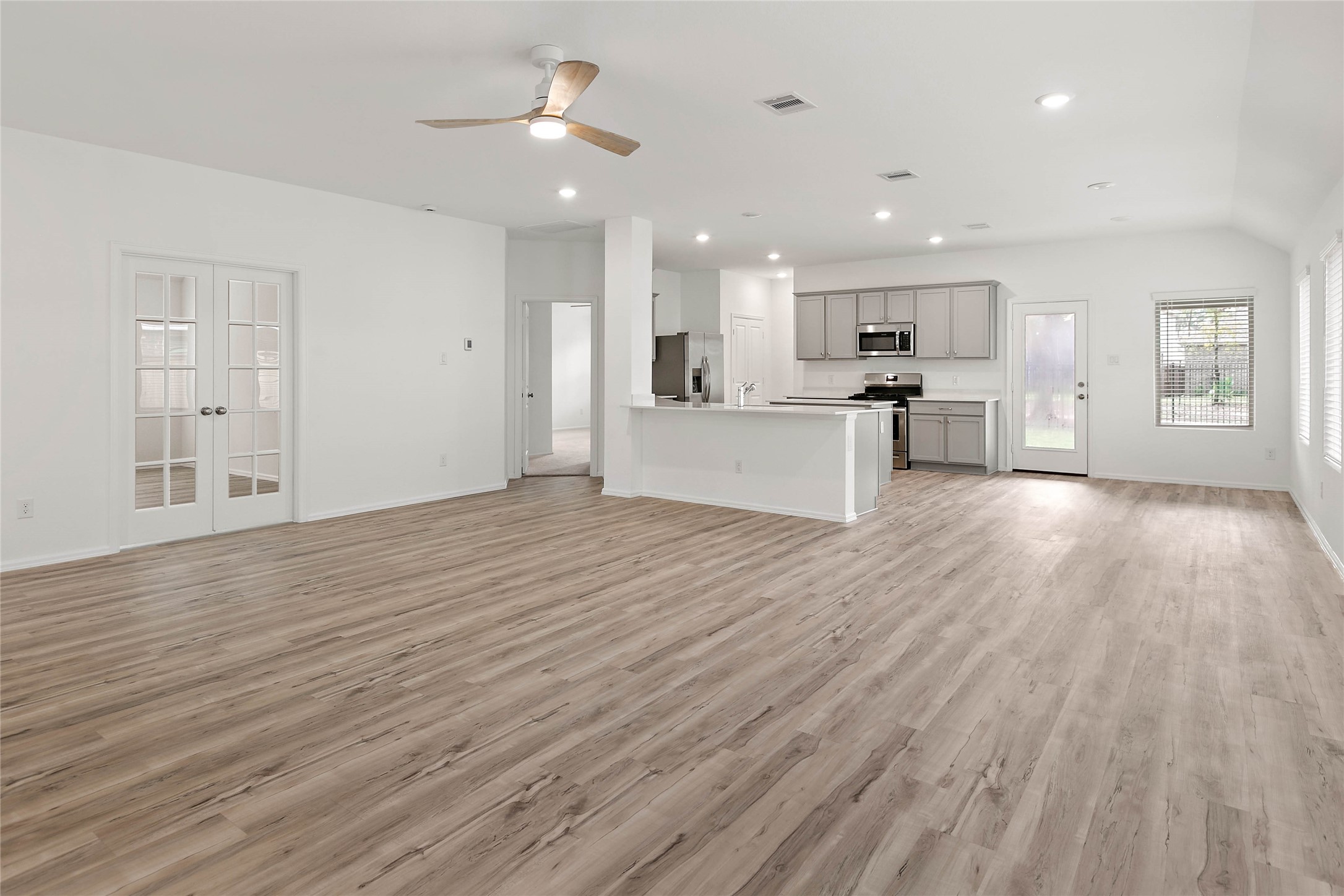 7602 Angels Lndg Lane Porter, TX 77365 - Photo 6 of 32 Off the open concept living area is a private study.
