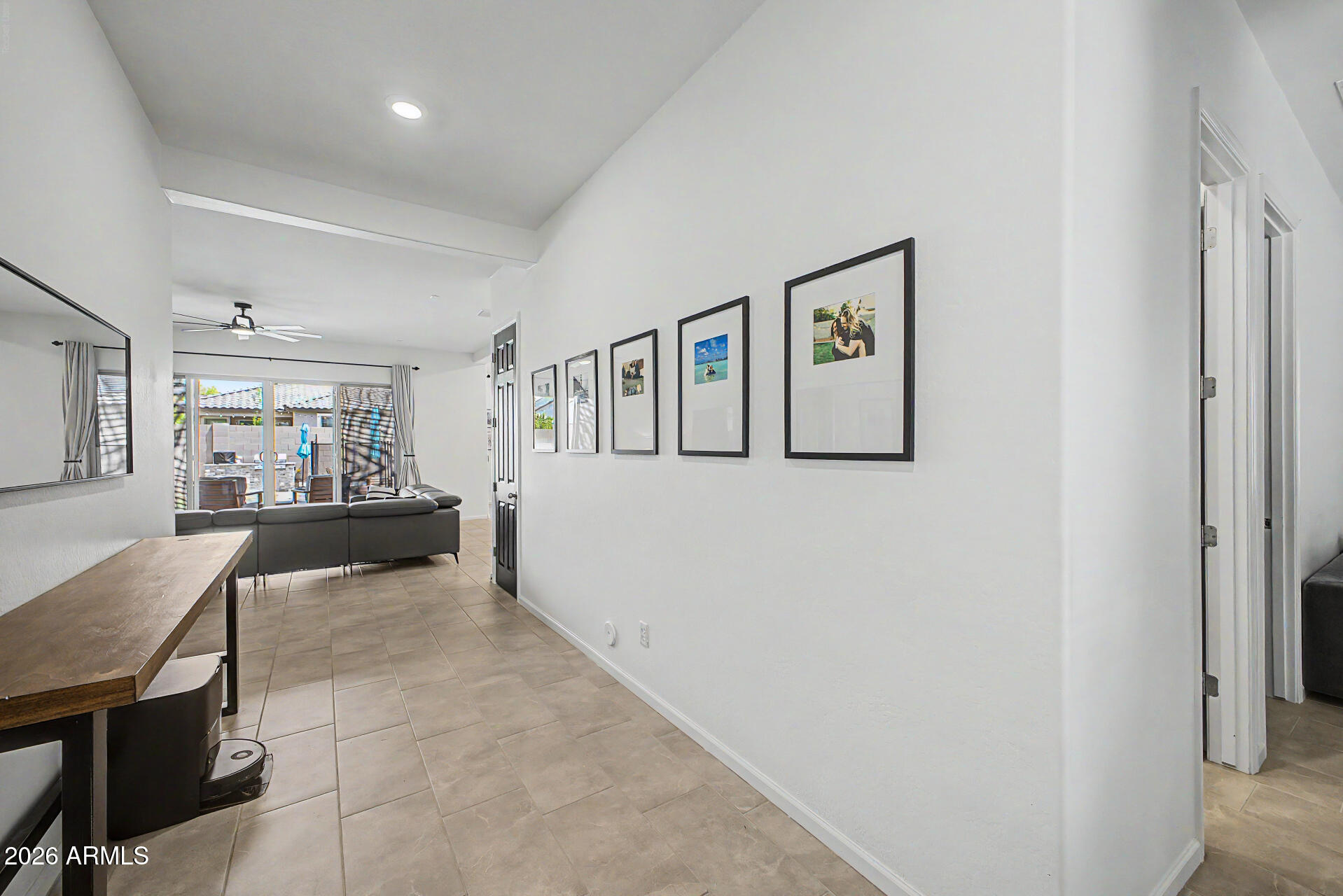 6511 West Steed Ridge Phoenix, AZ 85083 - Photo 13 of 41 a living room with furniture and paintings on the wall
