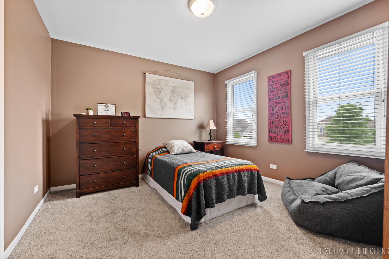 767 Wild Ginger Road Sugar Grove, IL 60554 - Photo 17 of 23 a bedroom with a bed and a dresser