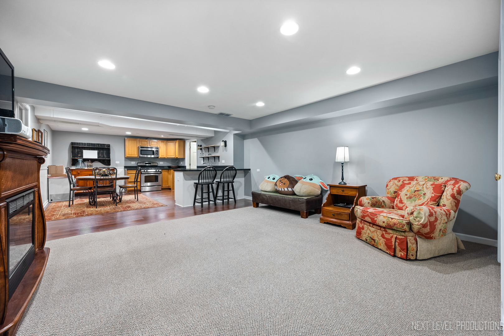 767 Wild Ginger Road Sugar Grove, IL 60554 - Photo 20 of 23 a living room with furniture and a flat screen tv