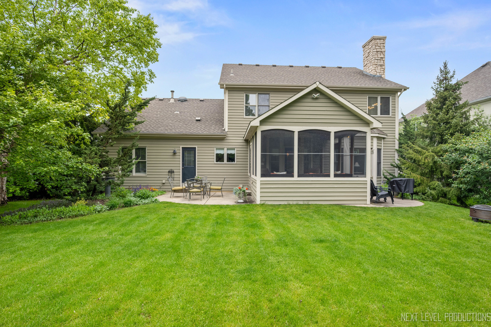 767 Wild Ginger Road Sugar Grove, IL 60554 - Photo 22 of 23 a view of a house with a yard