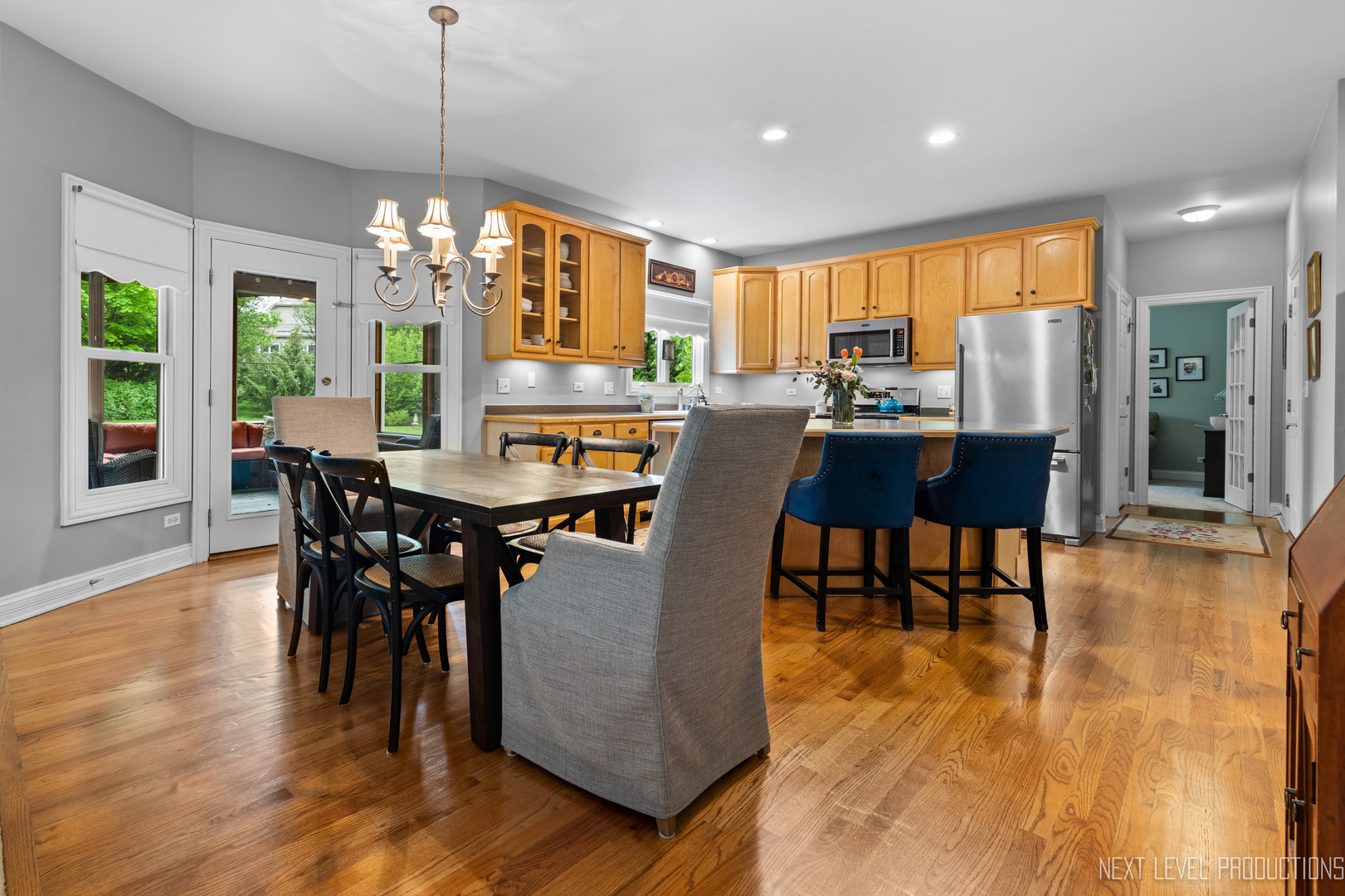 767 Wild Ginger Road Sugar Grove, IL 60554 - Photo 6 of 23 a view of a dining room with furniture window and wooden floor