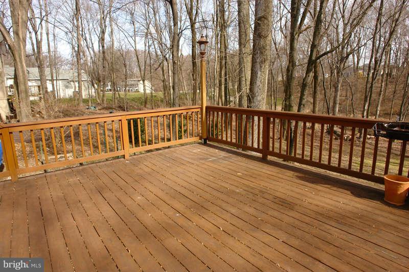 9505 Stewartown Road Gaithersburg, MD 20879 - Photo 22 of 30 Spacious deck overlooks wooded acreage