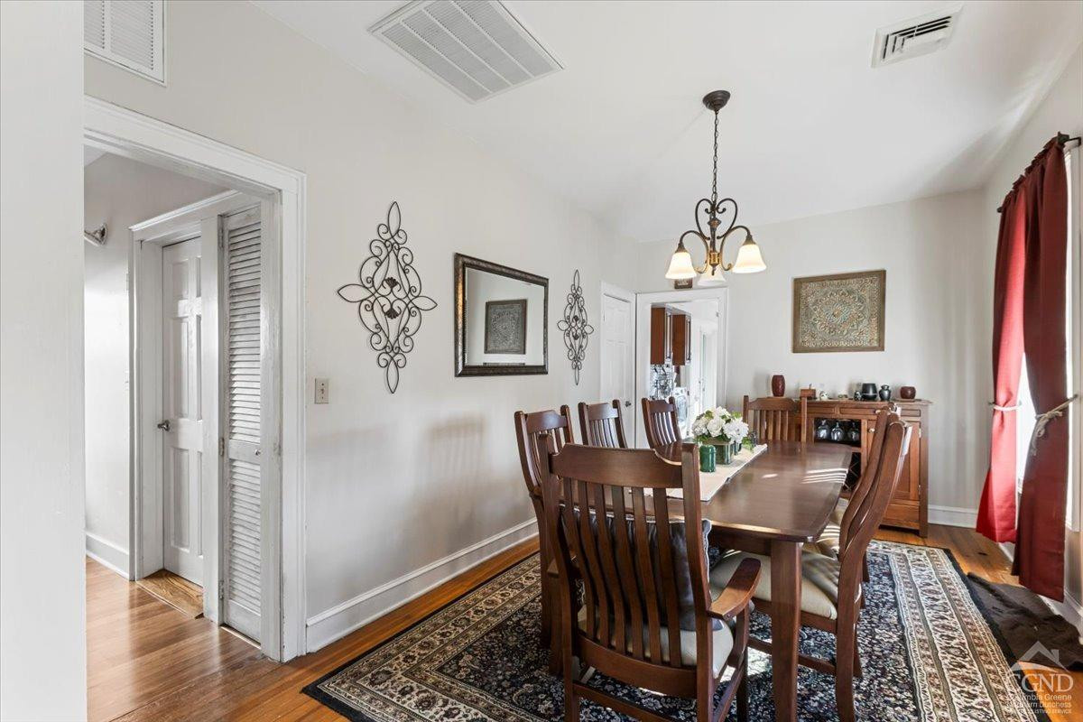 479 Main Street Cairo, NY 12413 - Photo 2 of 40 a view of a dining room with furniture window and wooden floor