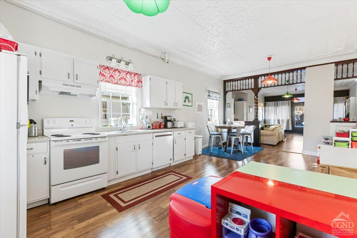479 Main Street Cairo, NY 12413 - Photo 25 of 40 a kitchen with stainless steel appliances granite countertop a stove a sink and a refrigerator