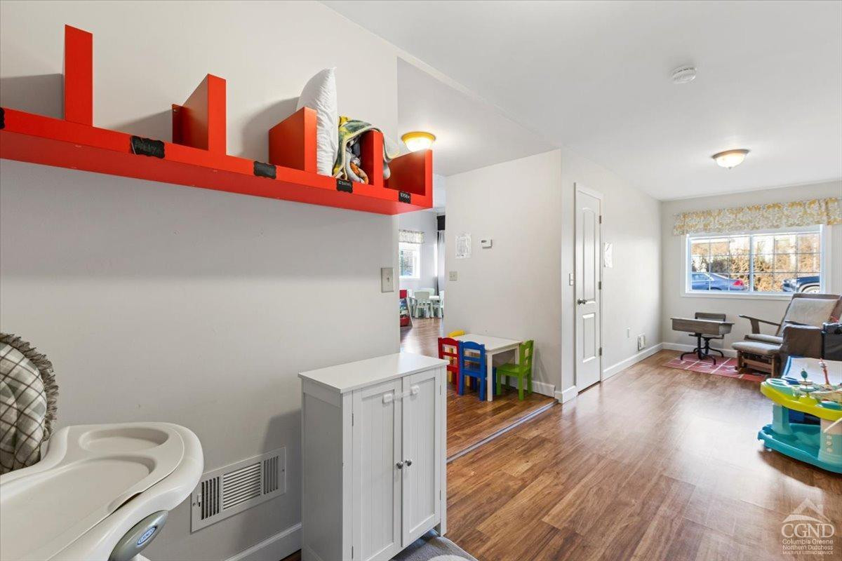 479 Main Street Cairo, NY 12413 - Photo 29 of 40 a bedroom with furniture and a wooden floor