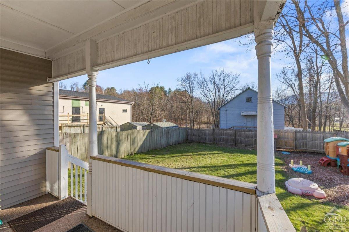 479 Main Street Cairo, NY 12413 - Photo 33 of 40 a view of a porch with furniture and garden