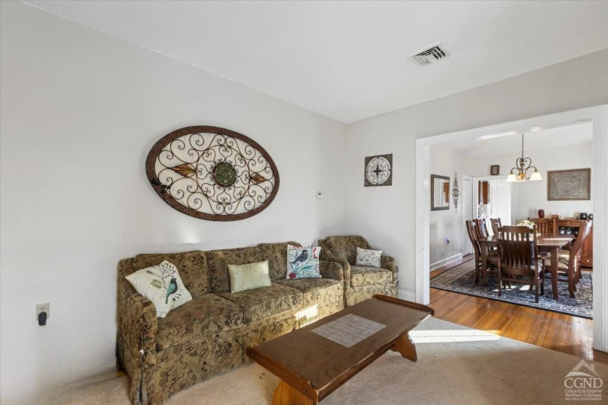 479 Main Street Cairo, NY 12413 - Photo 4 of 40 a living room with furniture and wooden floor