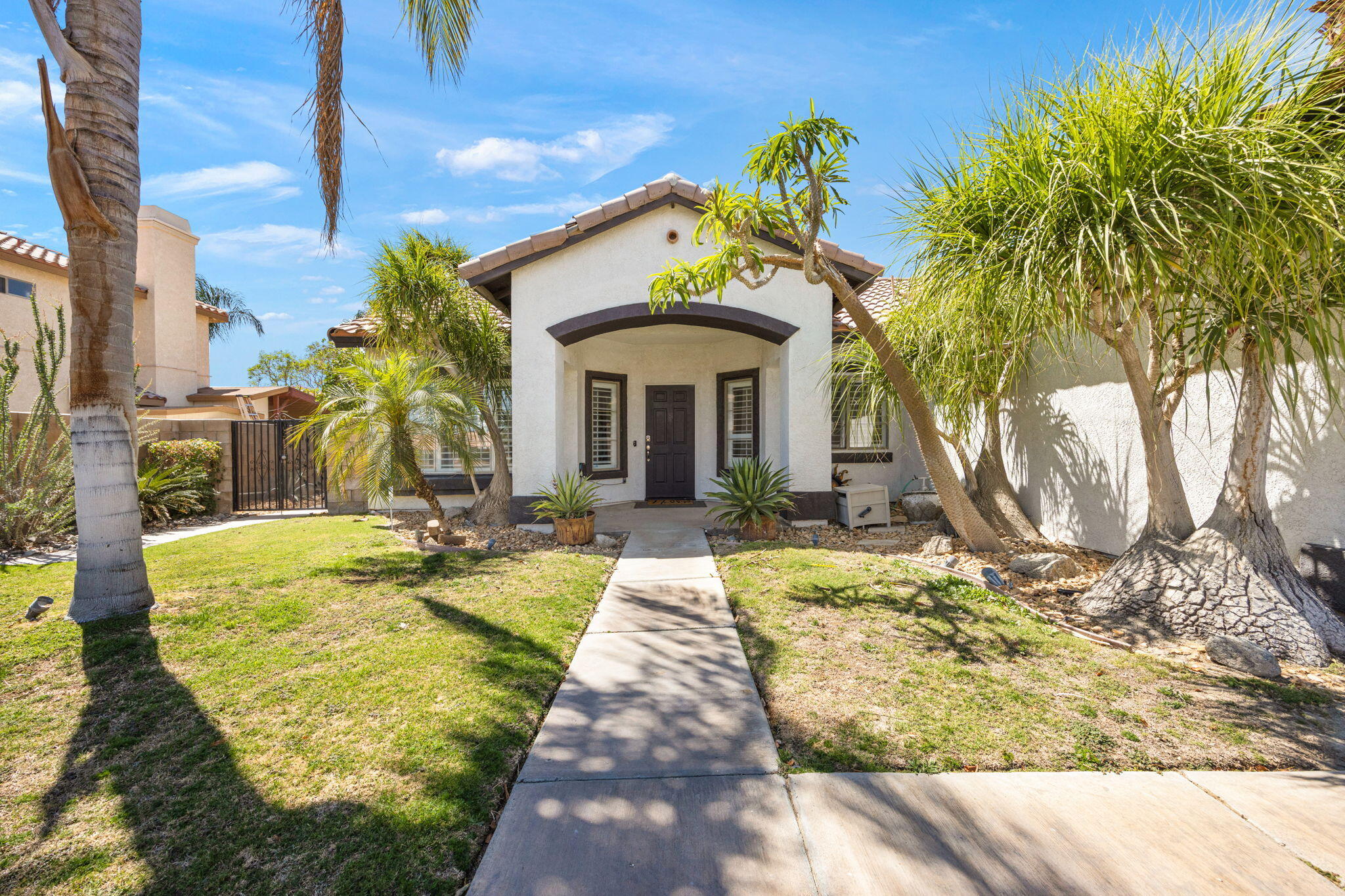 48701 Gibraltar Street Indio, CA 92201 - Photo 50 of 52 a view of a house with swimming pool