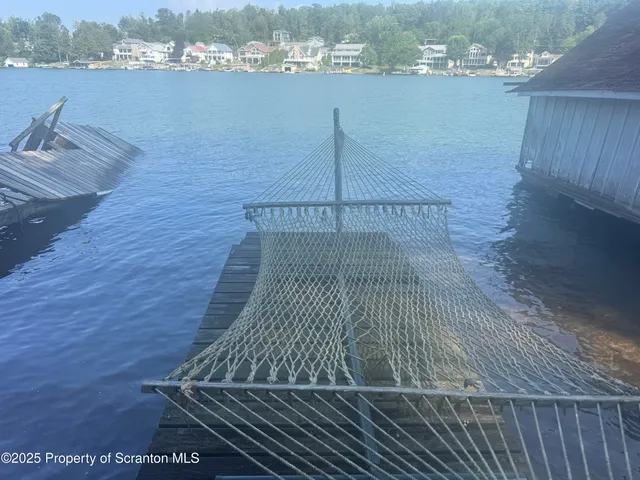 a view of balcony with wooden floor